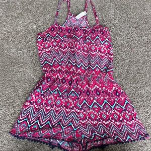 Super cute design romper. Women’s size large